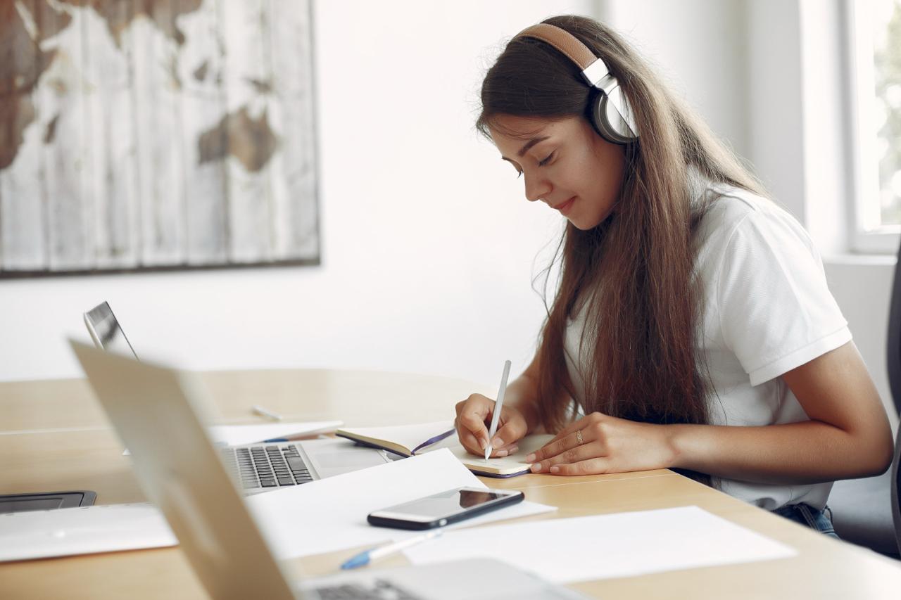 Student reviewing university details on laptop